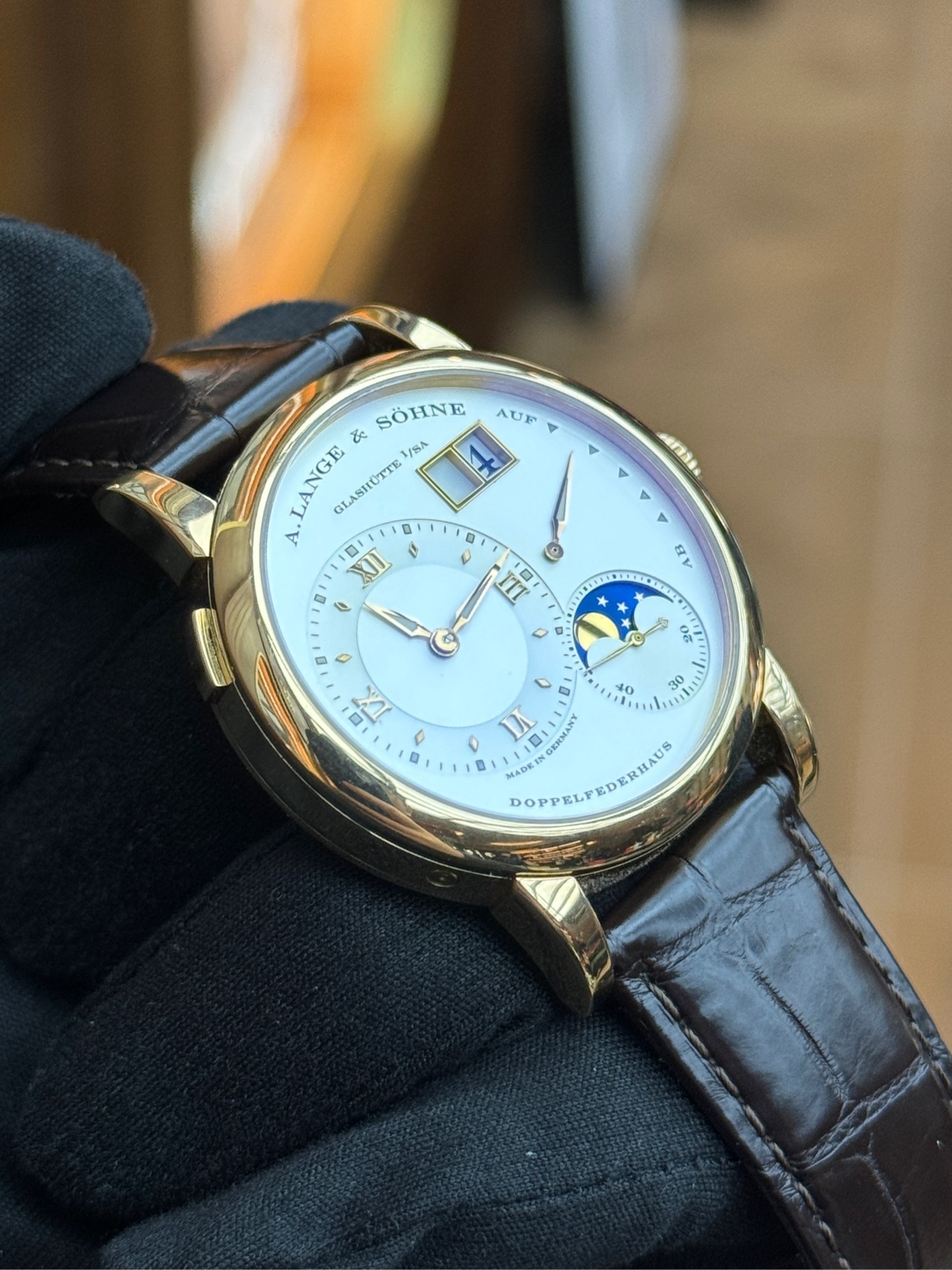 Collection of pre-owned luxury watches including Rolex and Patek Philippe.